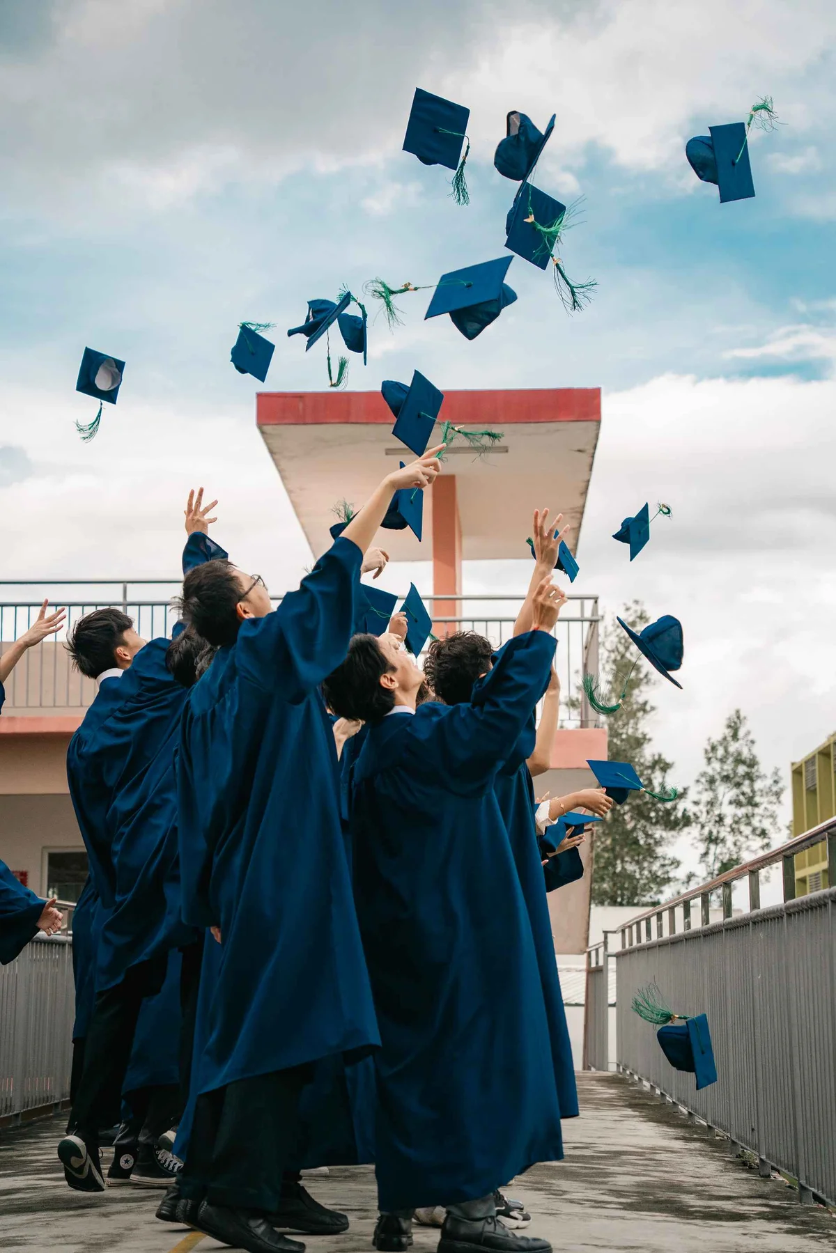 Students posing after graduation