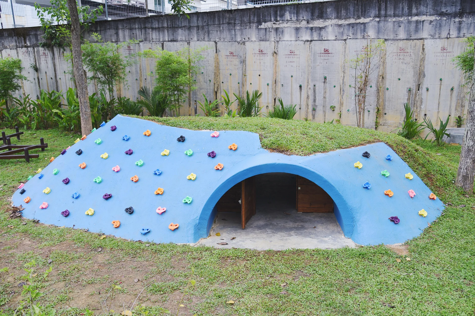 Early years outdoor playground - climbing wall & hobbit hole