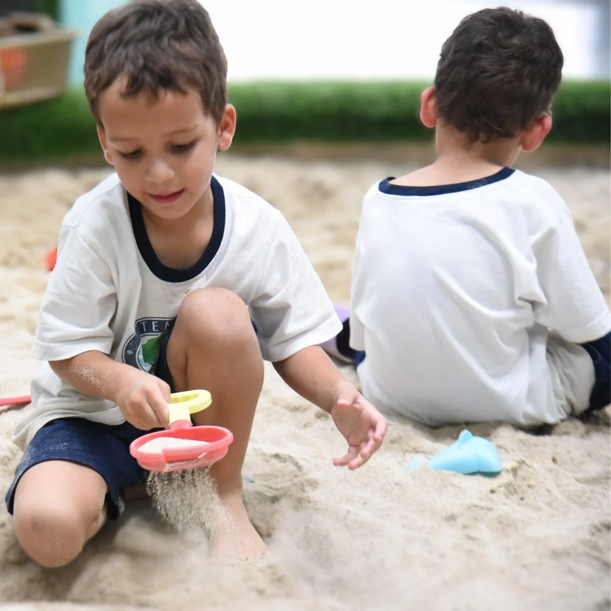 Kids playing in the sand