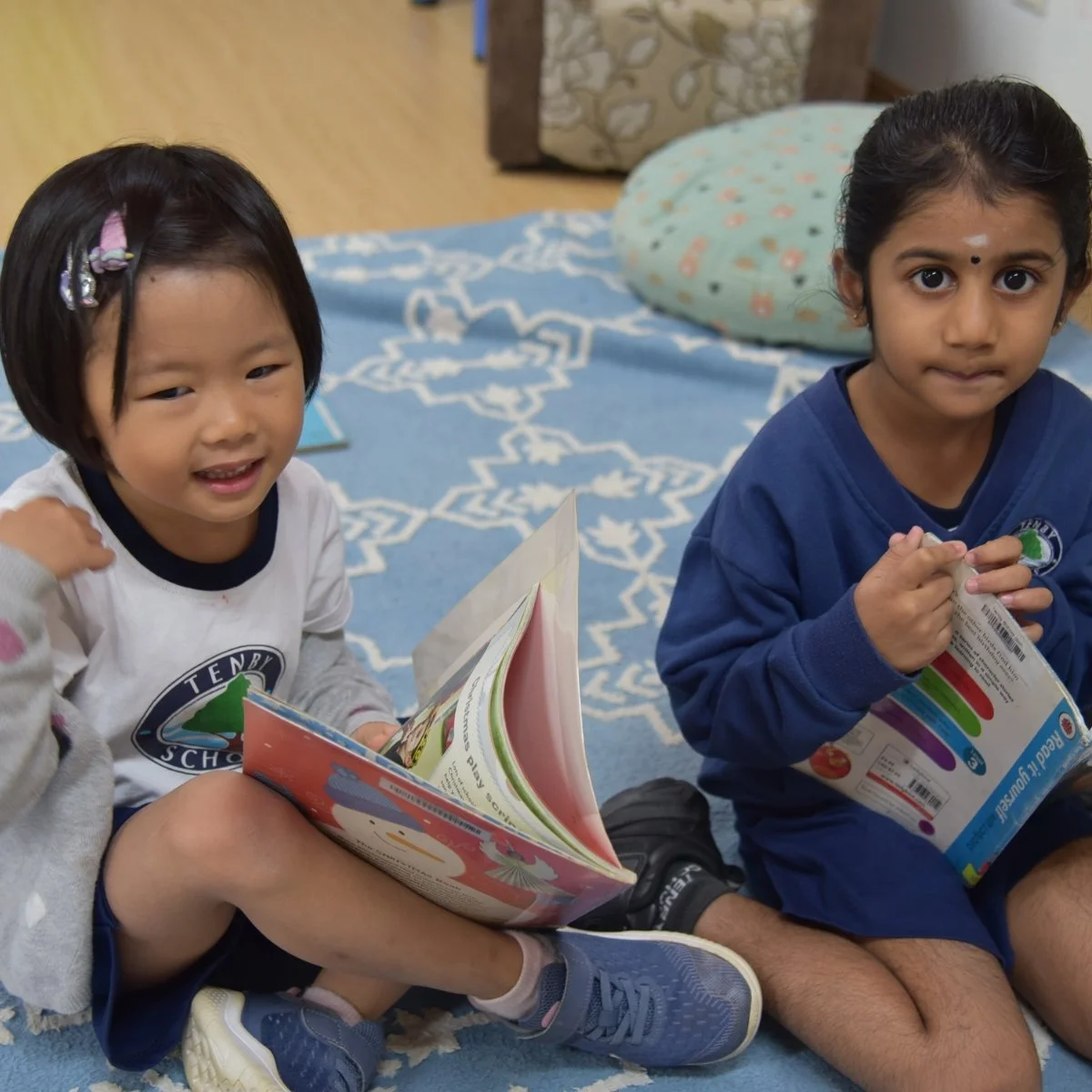 Kids holding books