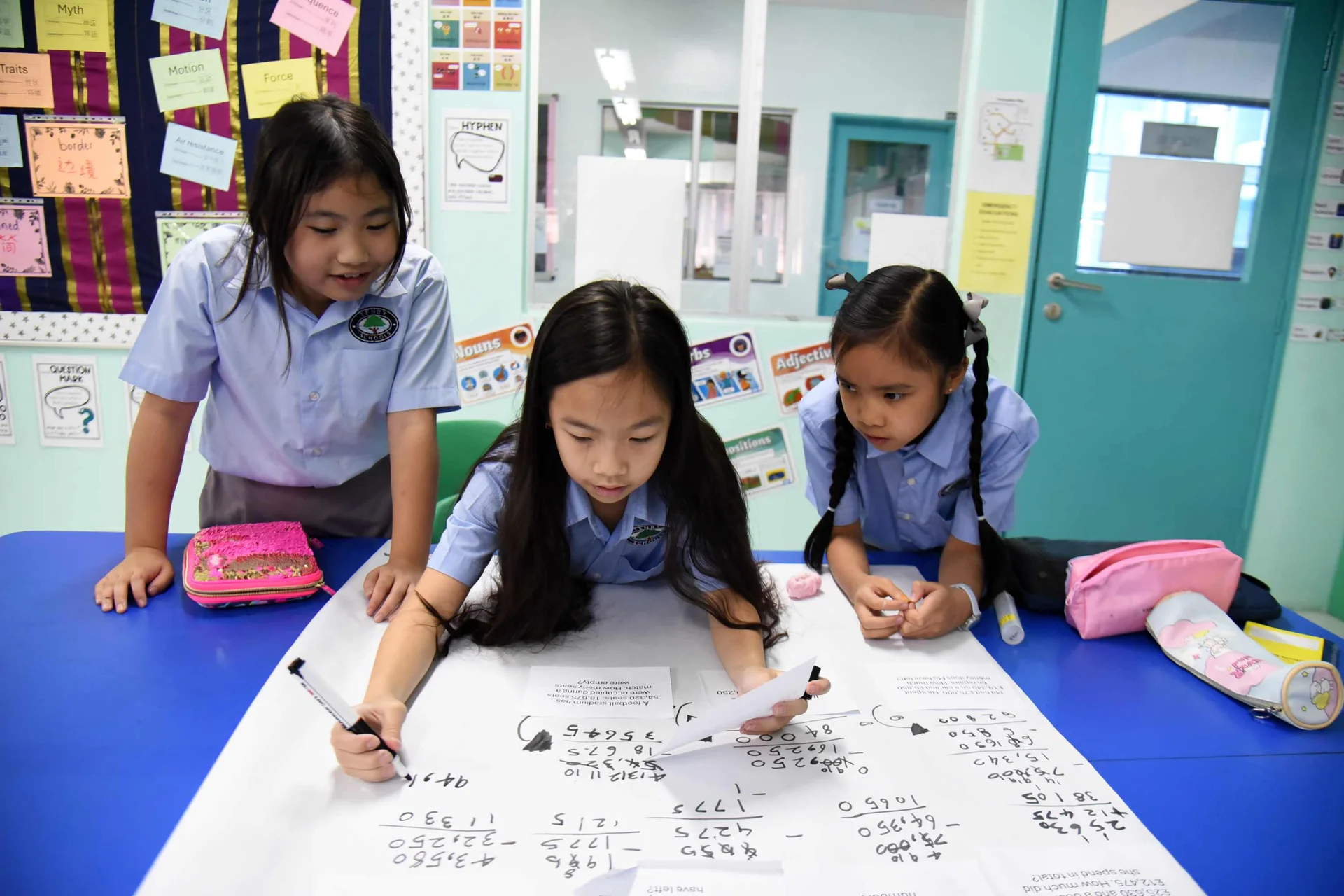 Primary school students doing calculations