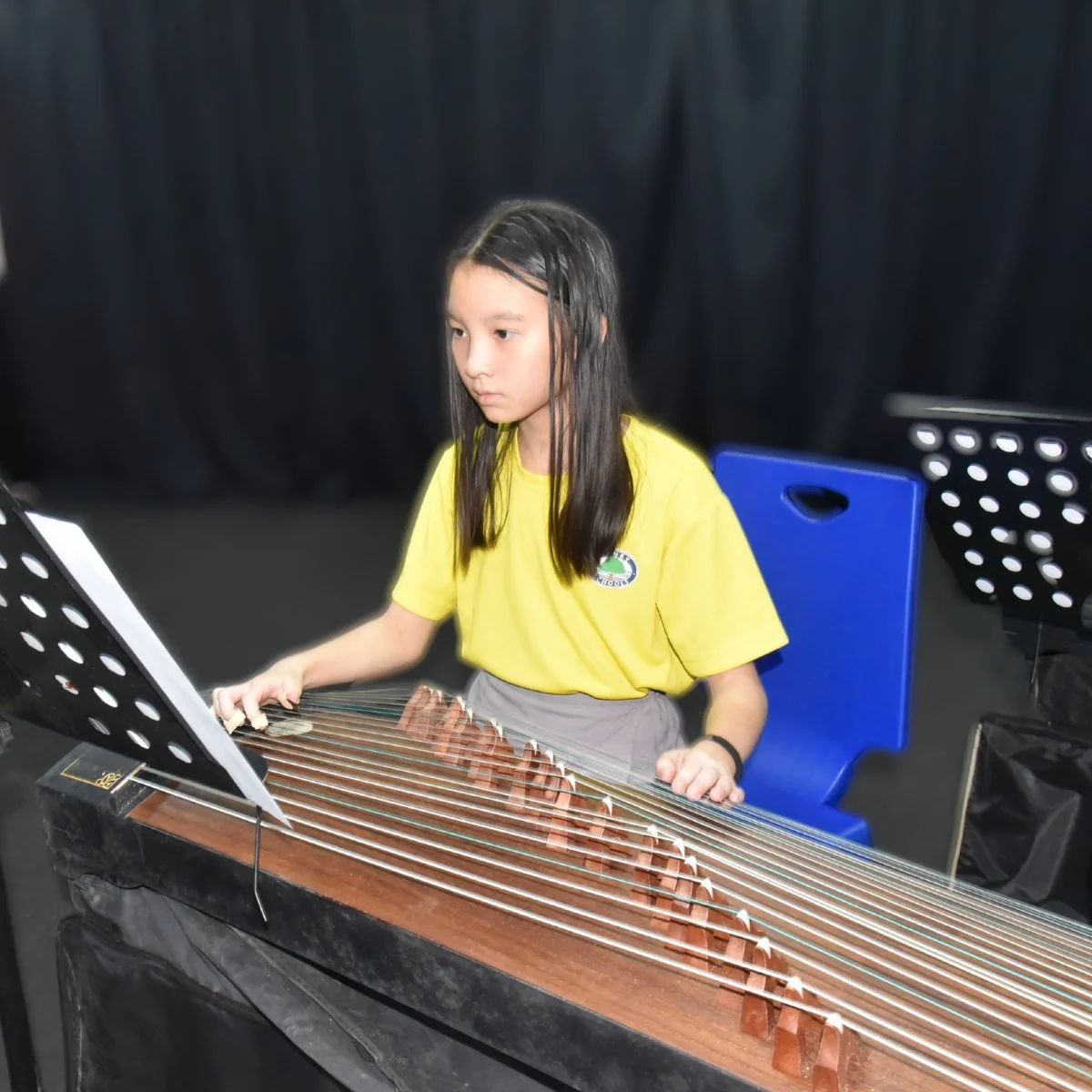 Kid playing an instrument