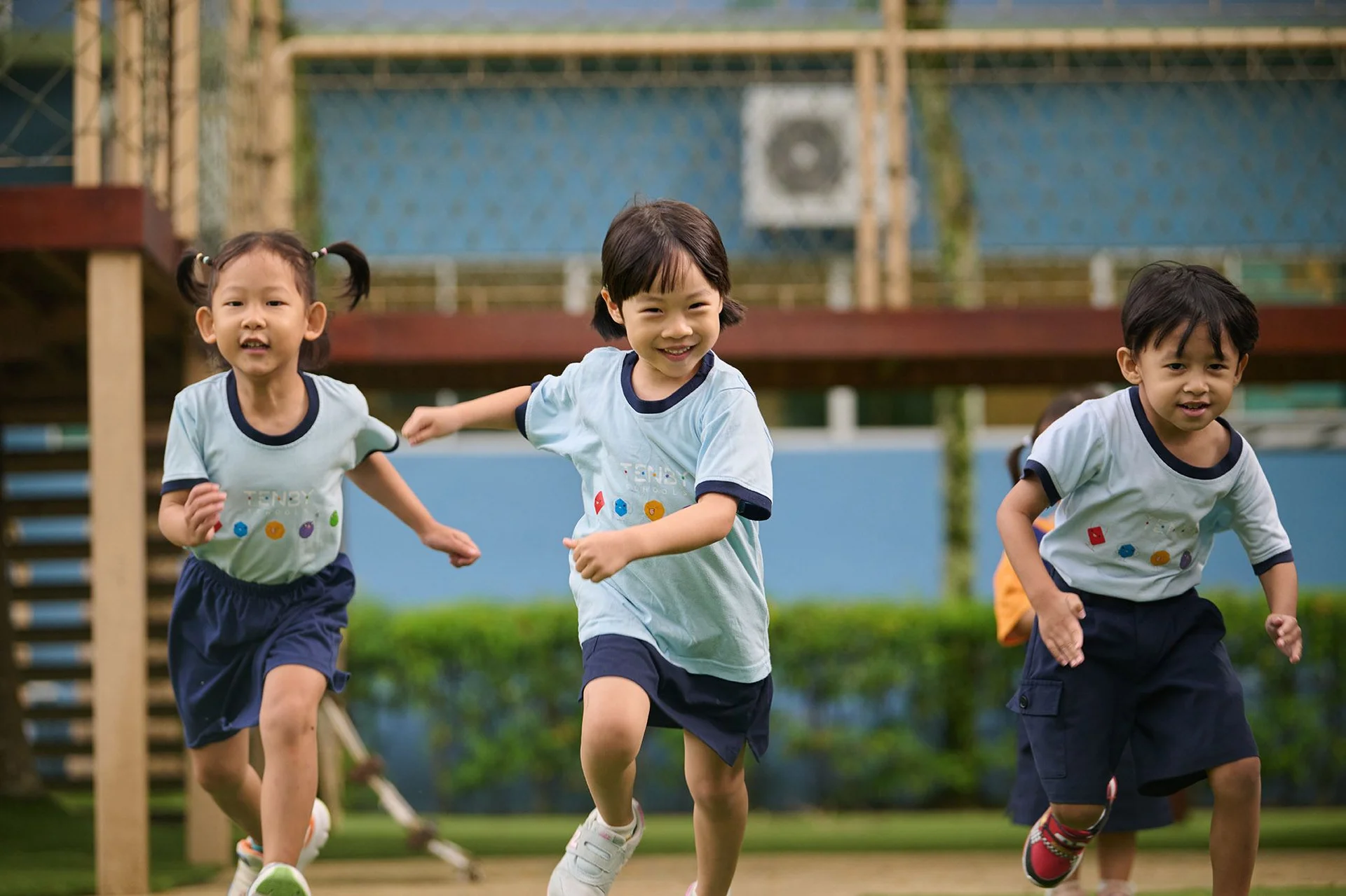 Kids running and smiling