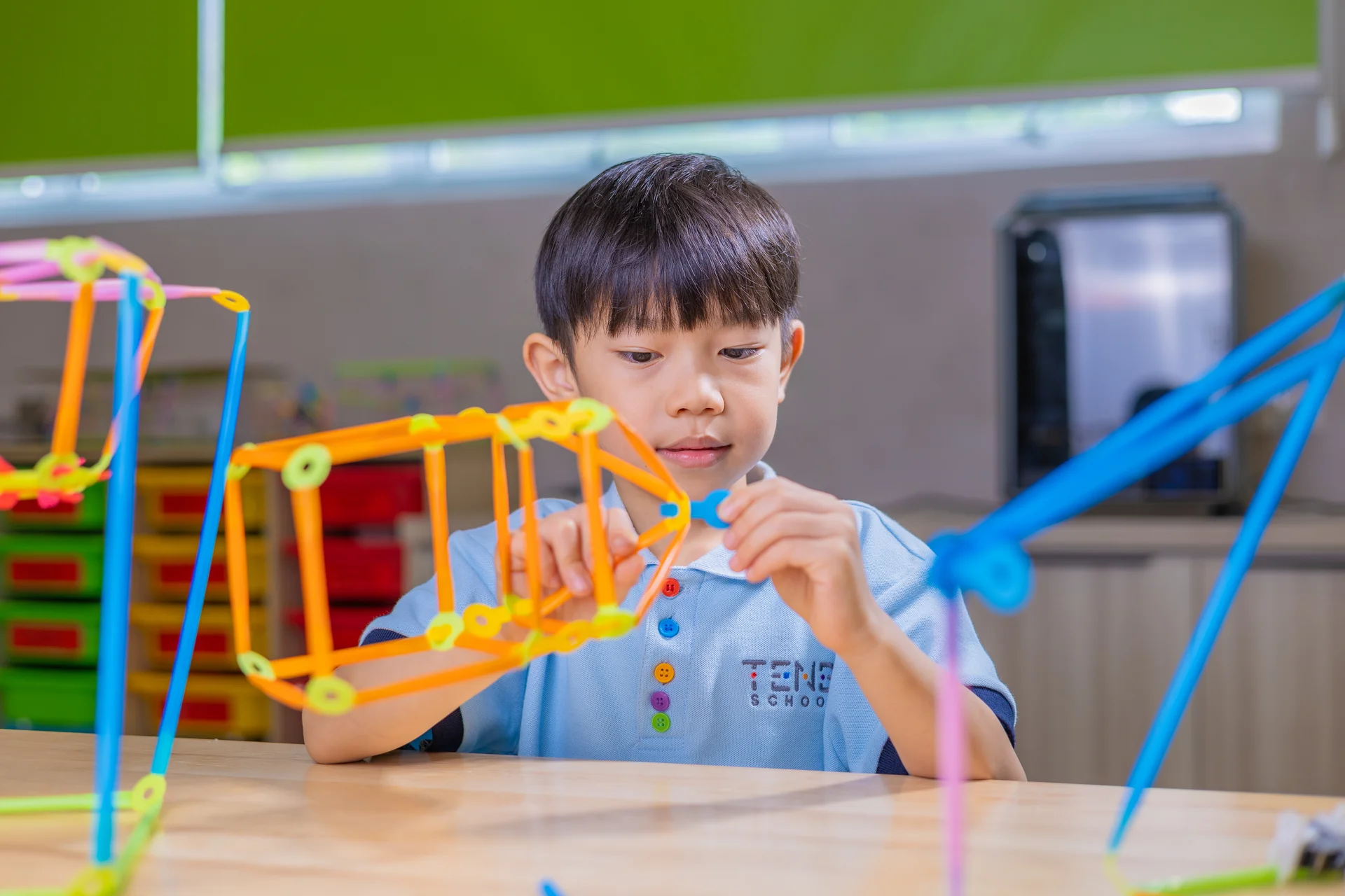 Boy playing with educational toys