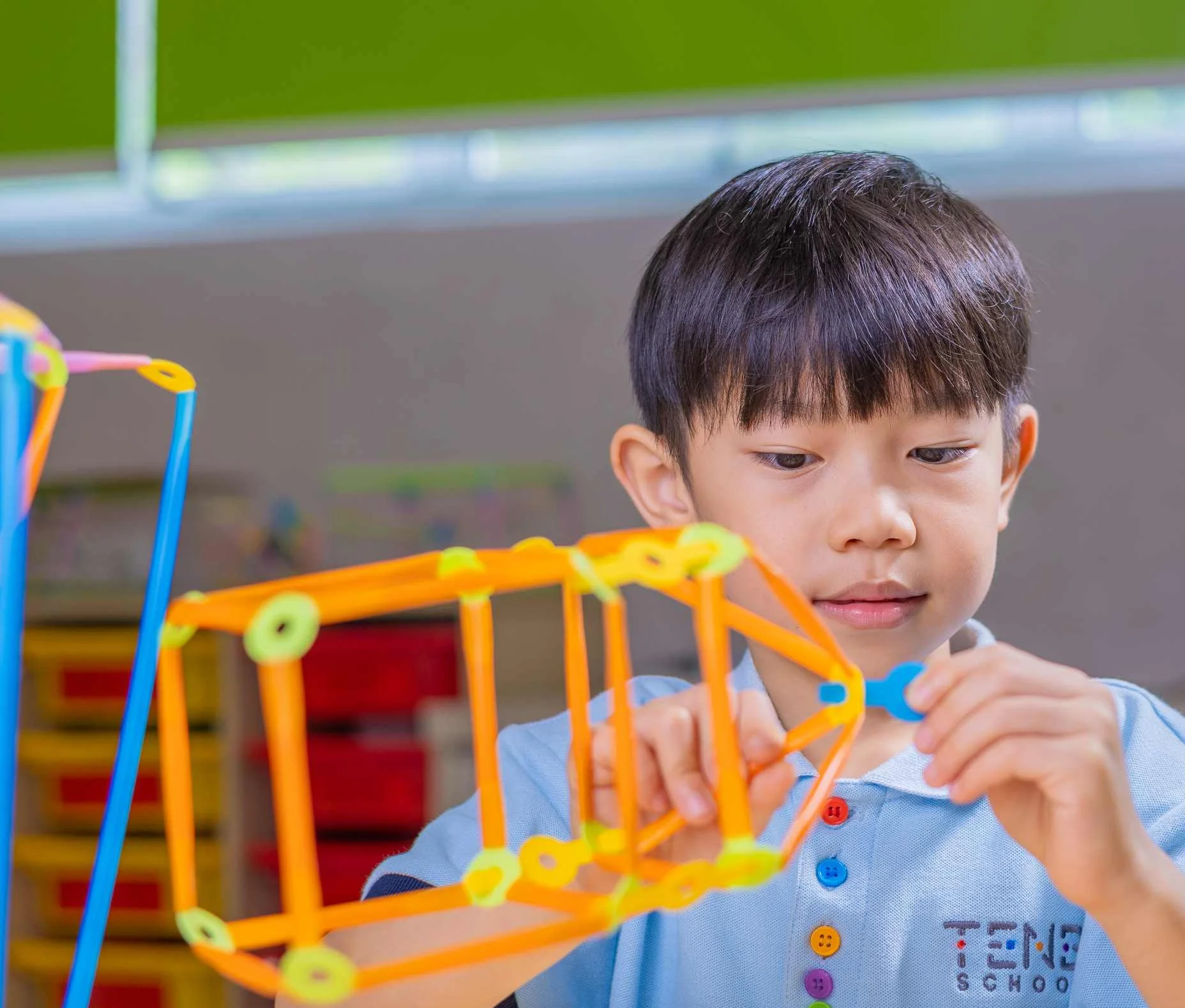 Boy playing with educational toys