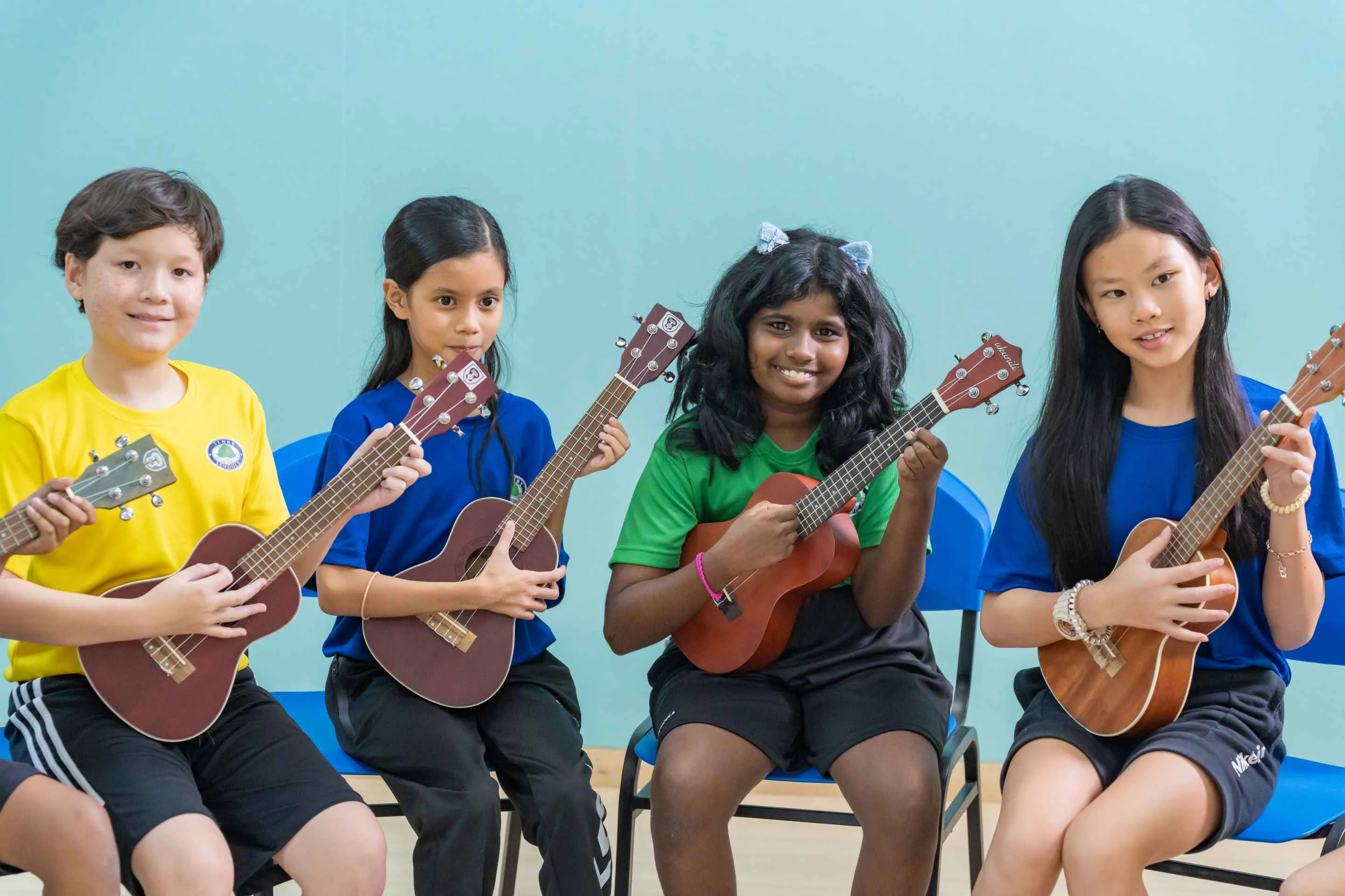 Kids playing guitars