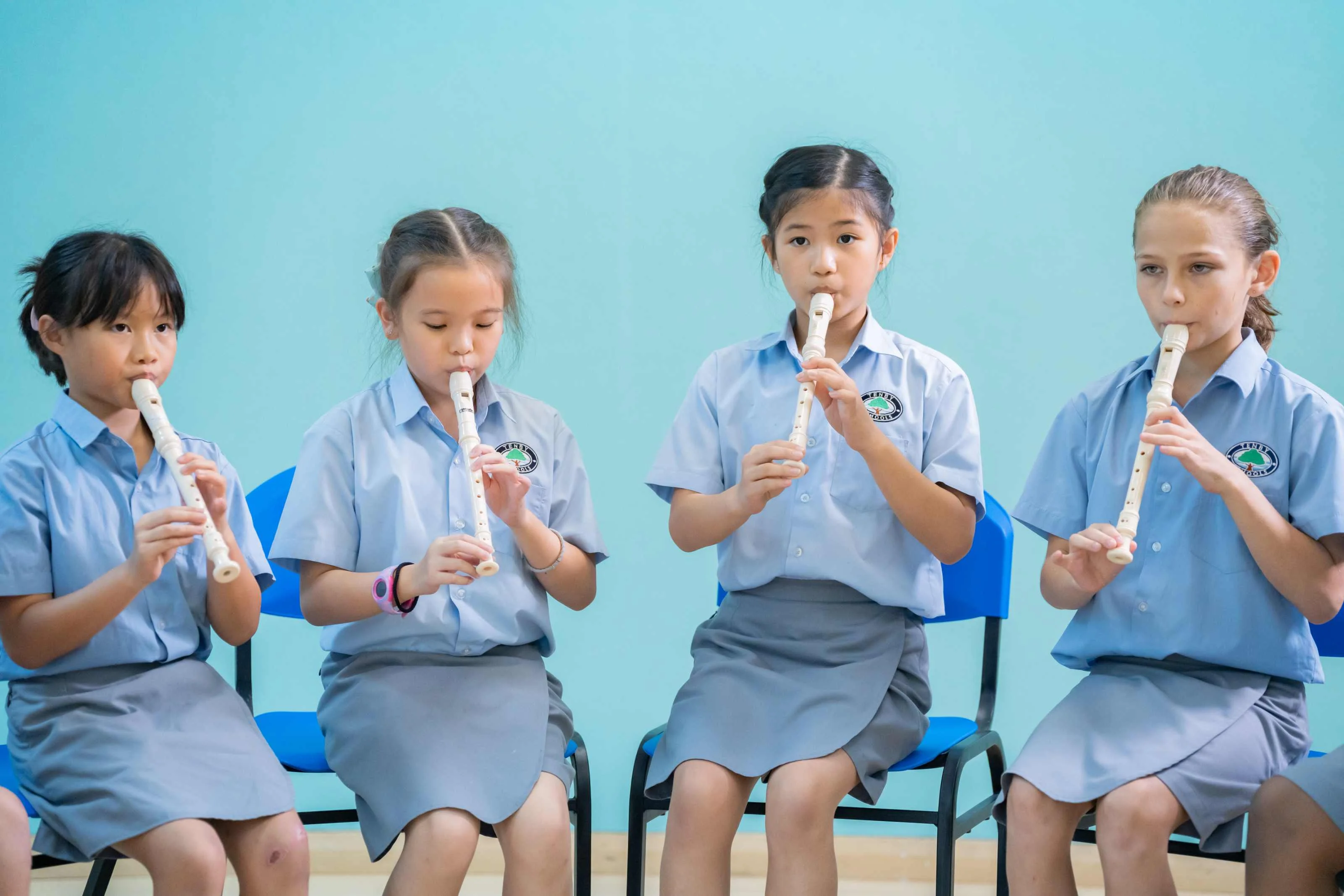 Girls playing the flute