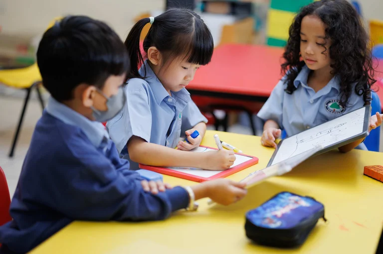Young students drawing