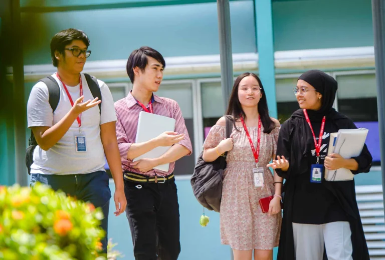 Students talking together while walking