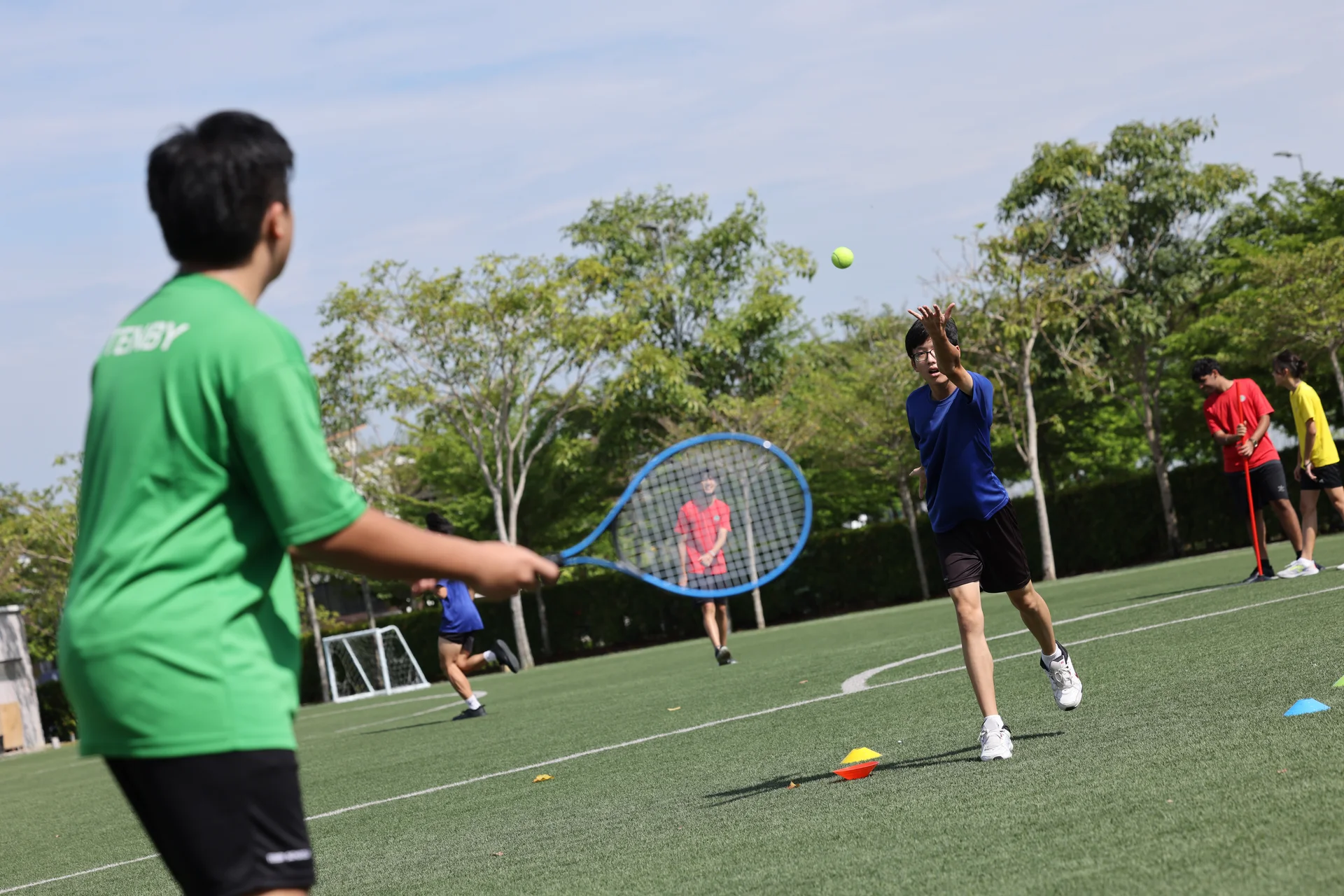 Tennis Court - A dedicated court for tennis lessons and matches, promoting skills development and physical fitness.