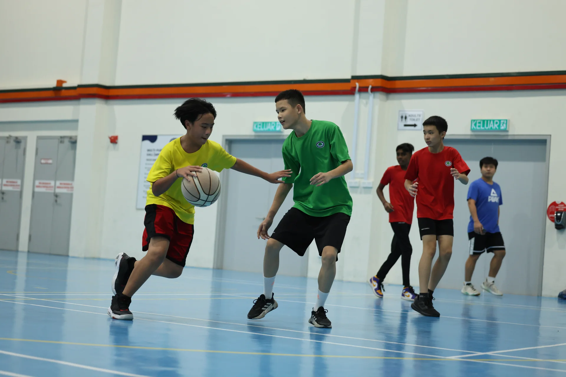 Basketball Court - A dedicated area for basketball games, training sessions and fostering teamwork and physical fitness.