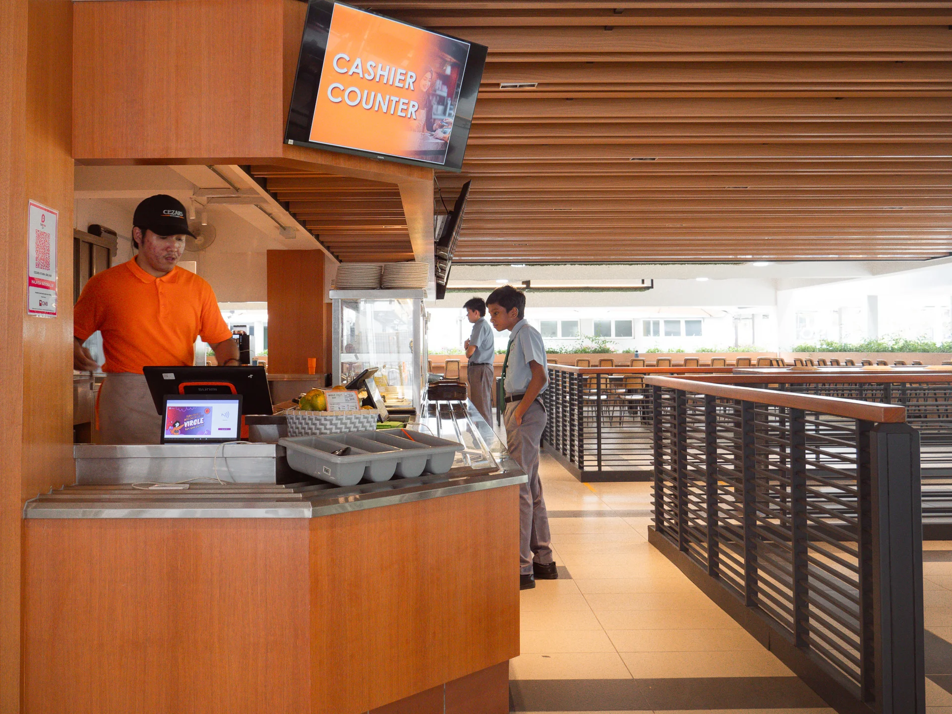 Cafeteria - A welcoming dining space offering a variety of nutritious meals and freshly baked pastries, providing a comfortable environment for students and staff to enjoy their breaks.