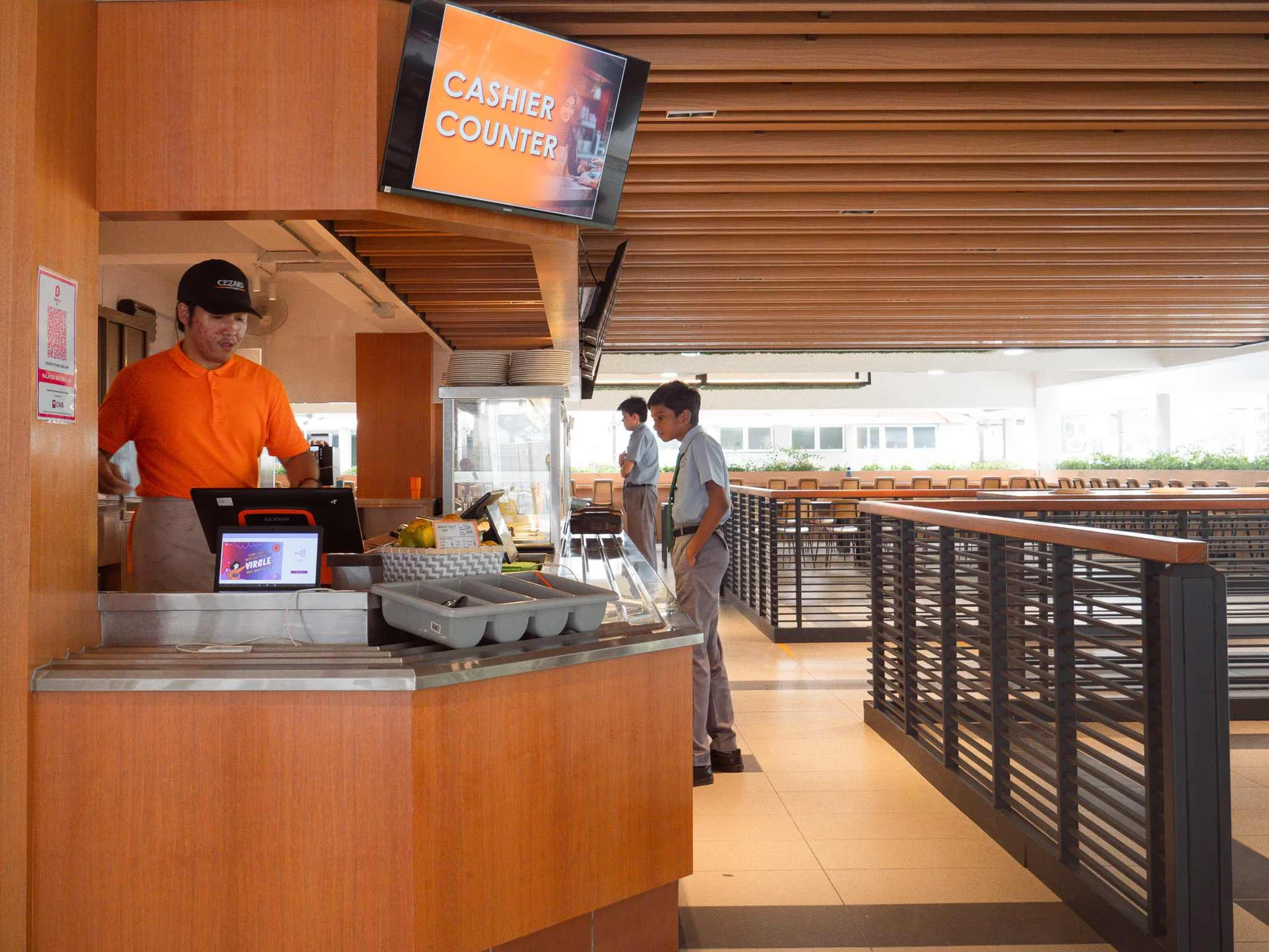 Cafeteria - A welcoming dining space offering a variety of nutritious meals and freshly baked pastries, providing a comfortable environment for students and staff to enjoy their breaks.